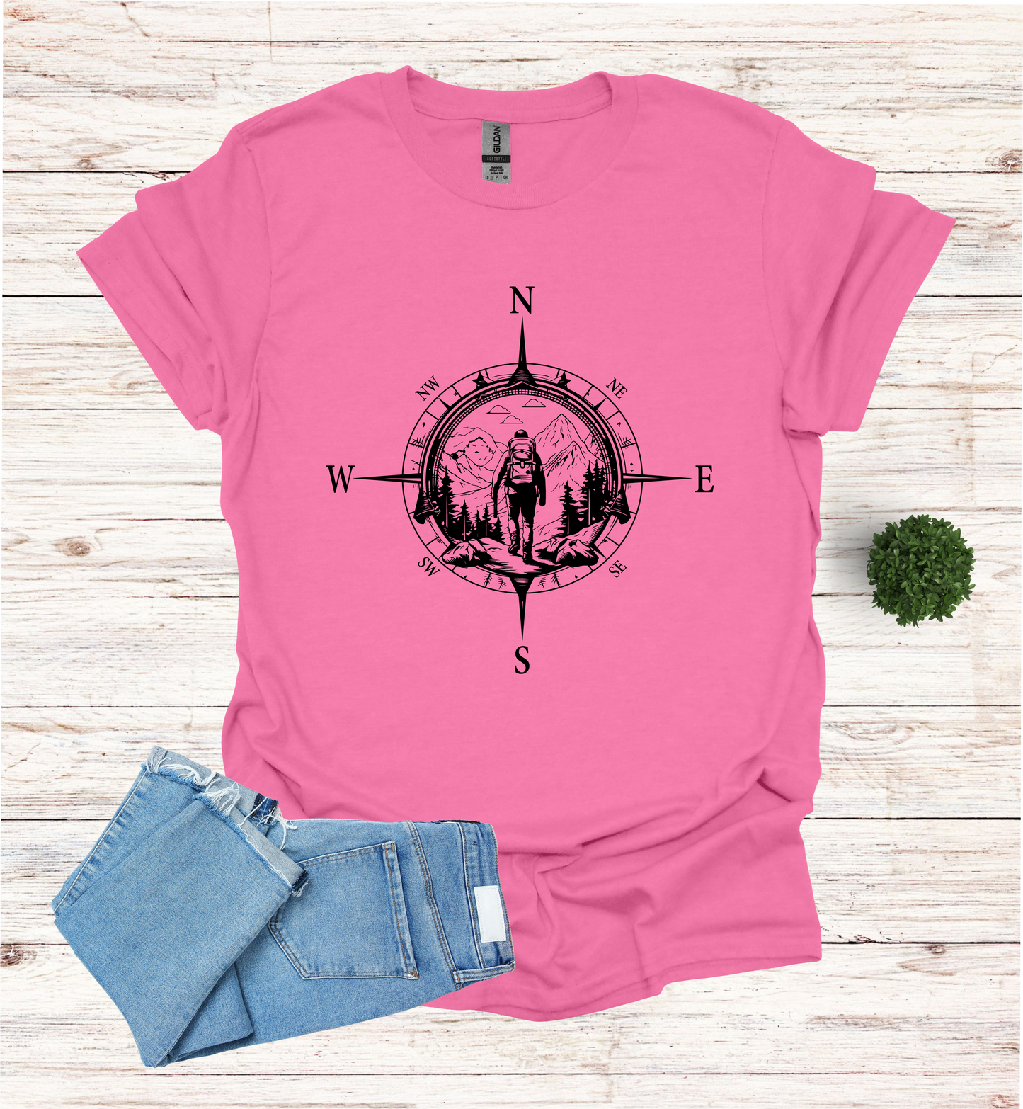 Hiker walking in wilderness compass scene