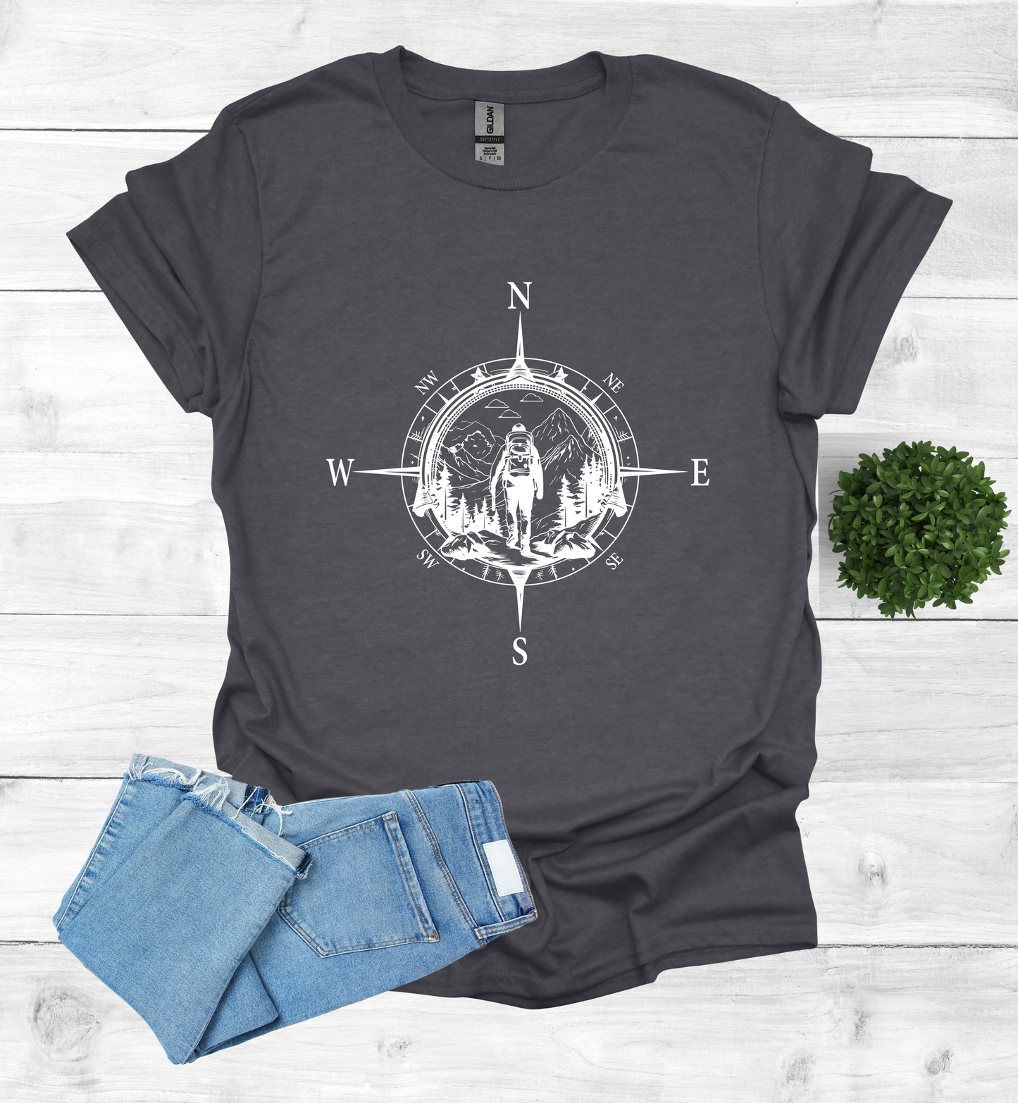 Hiker walking in wilderness compass scene