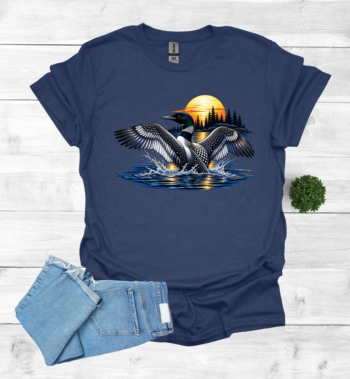 Loon flutters wings on the water