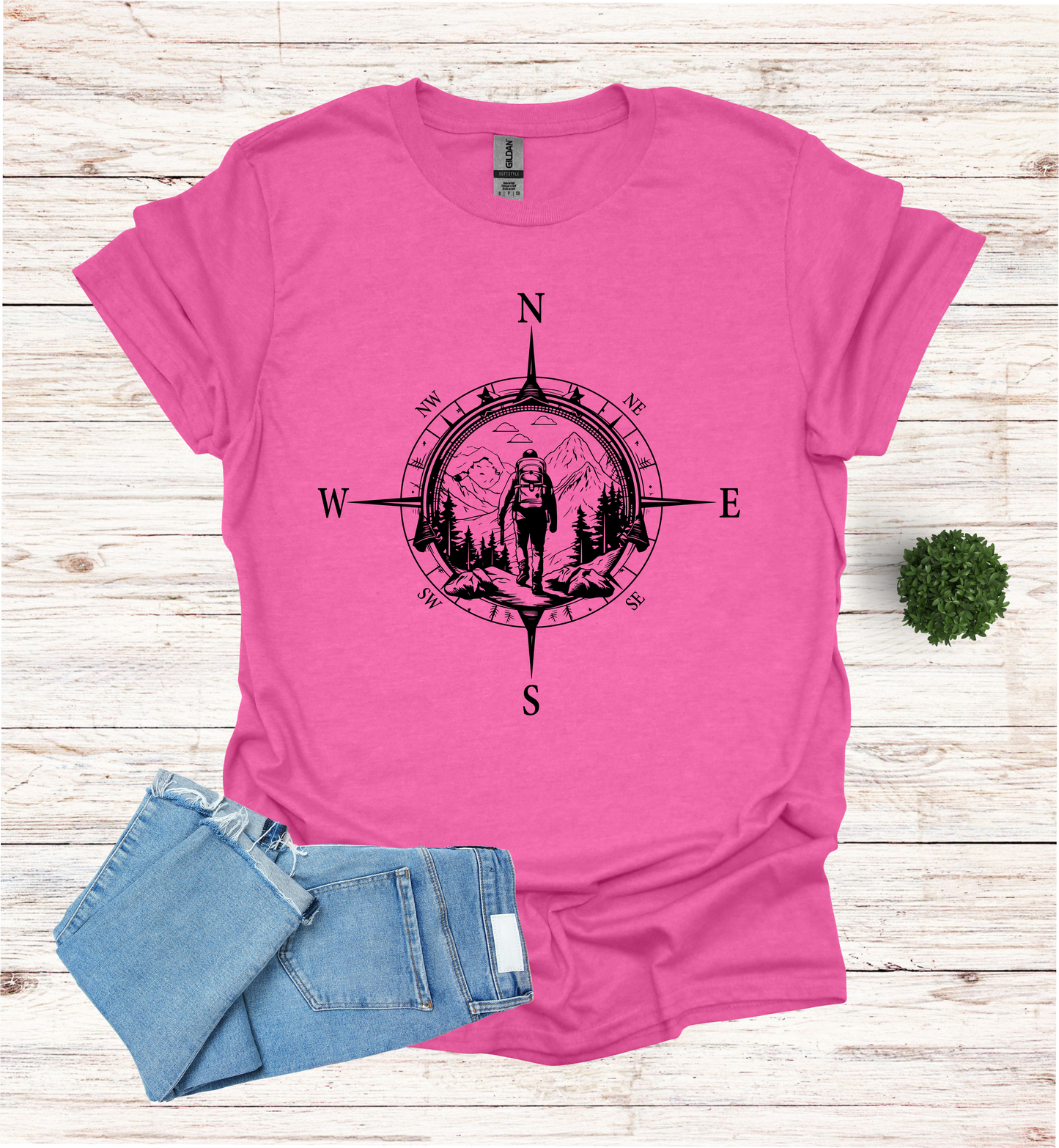 Hiker walking in wilderness compass scene