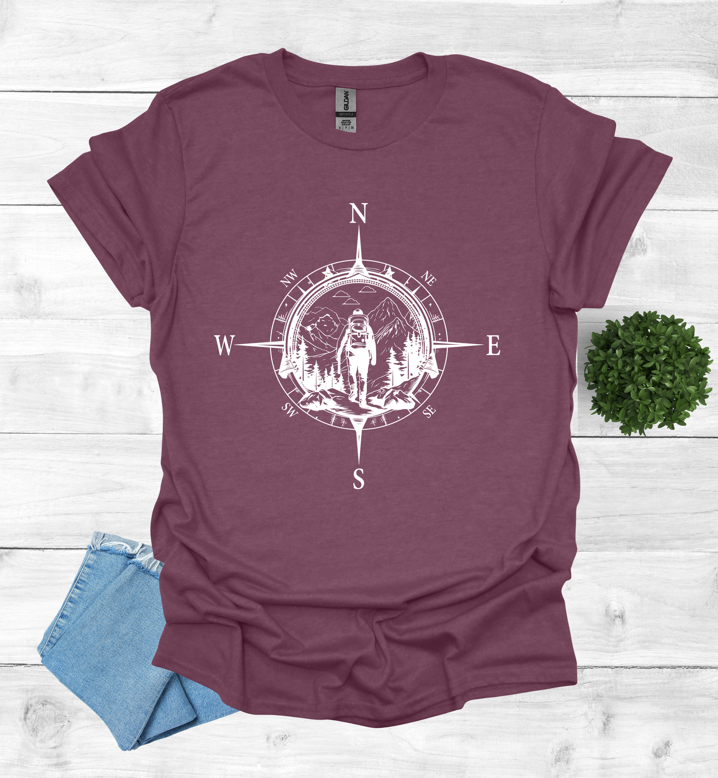 Hiker walking in wilderness compass scene