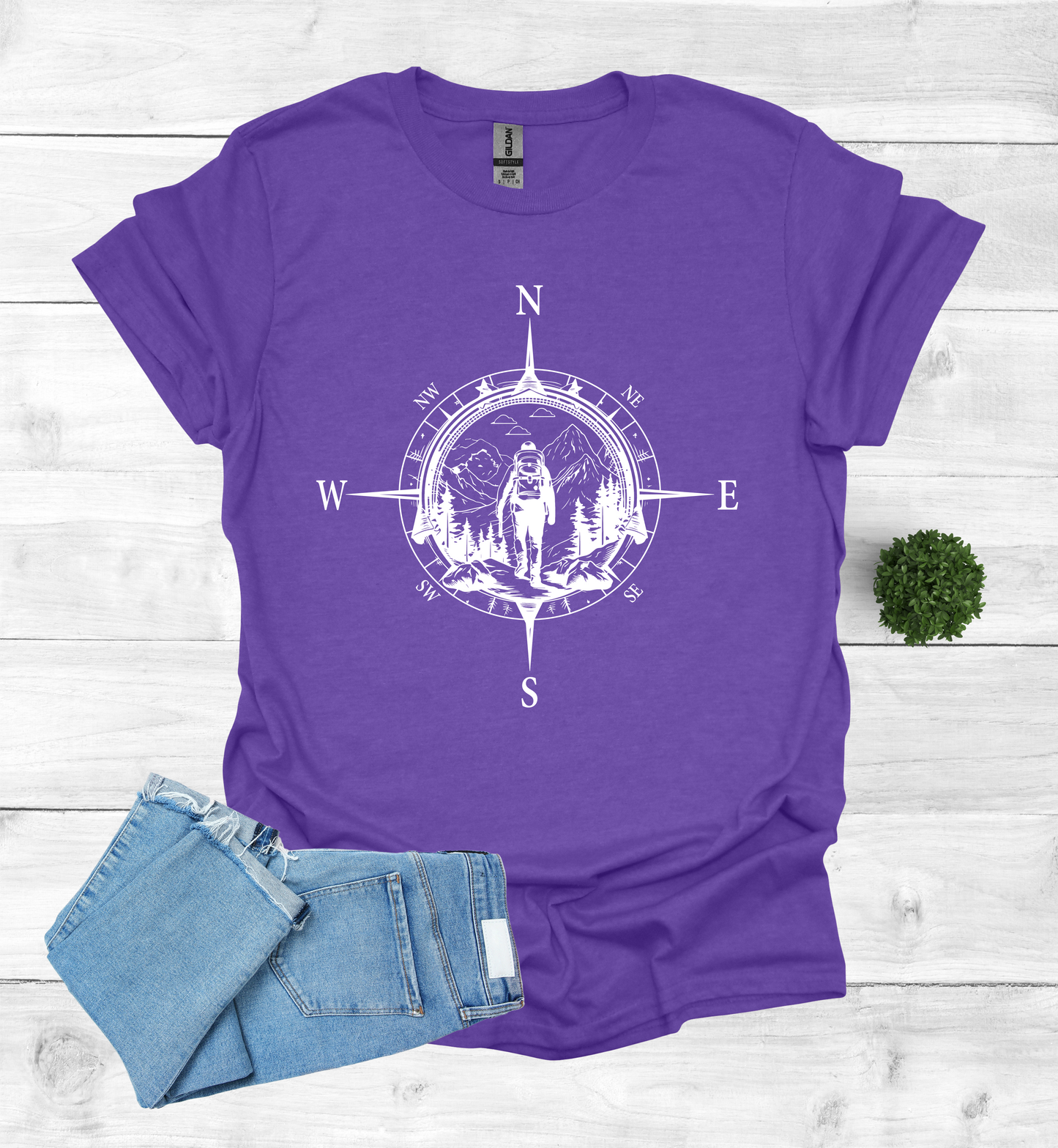 Hiker walking in wilderness compass scene