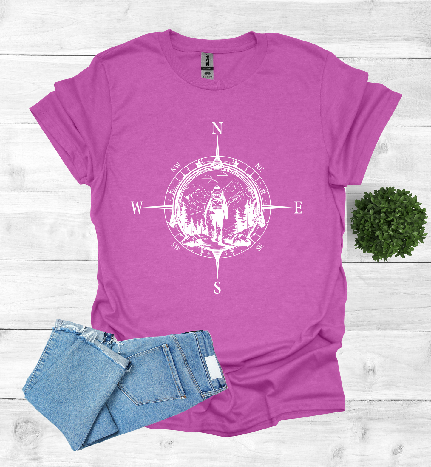 Hiker walking in wilderness compass scene