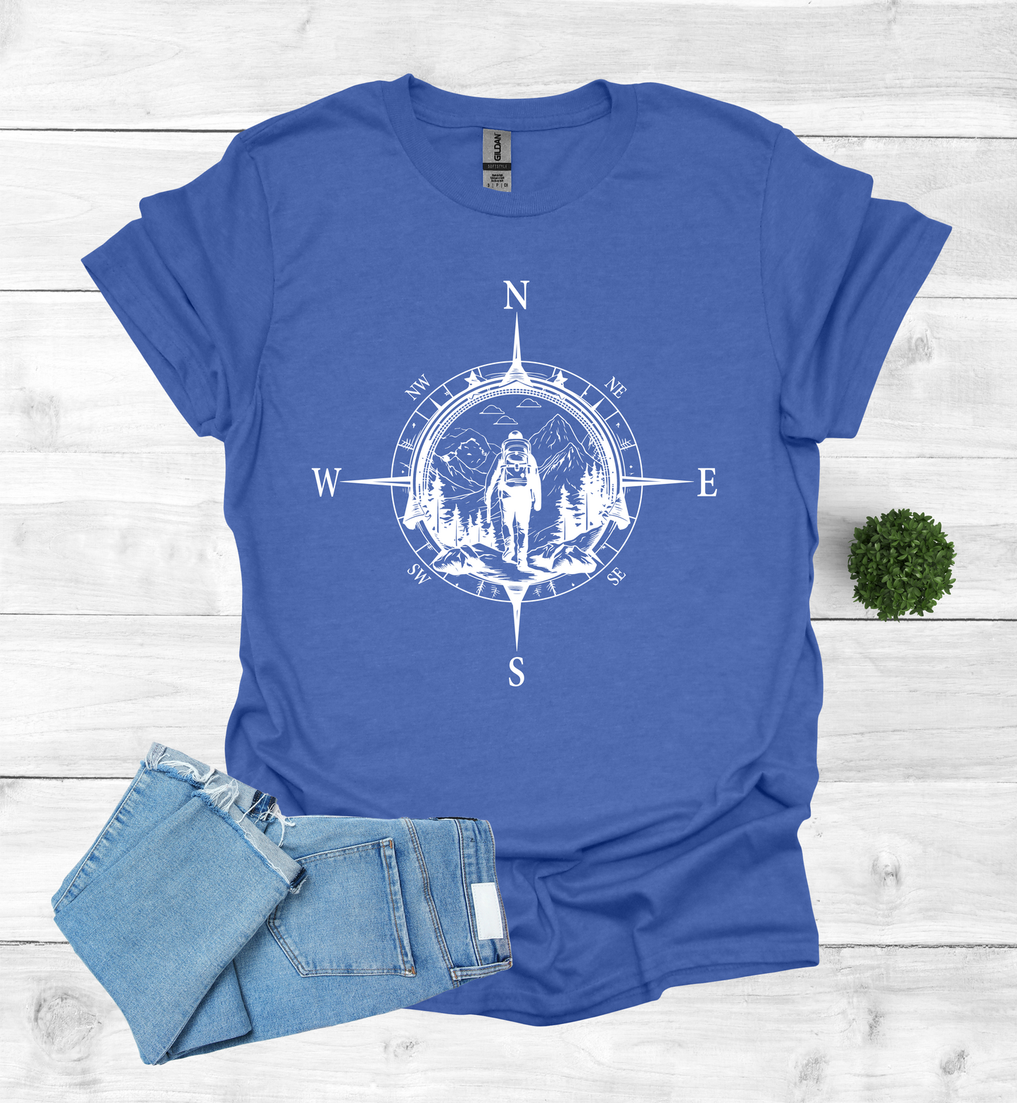 Hiker walking in wilderness compass scene
