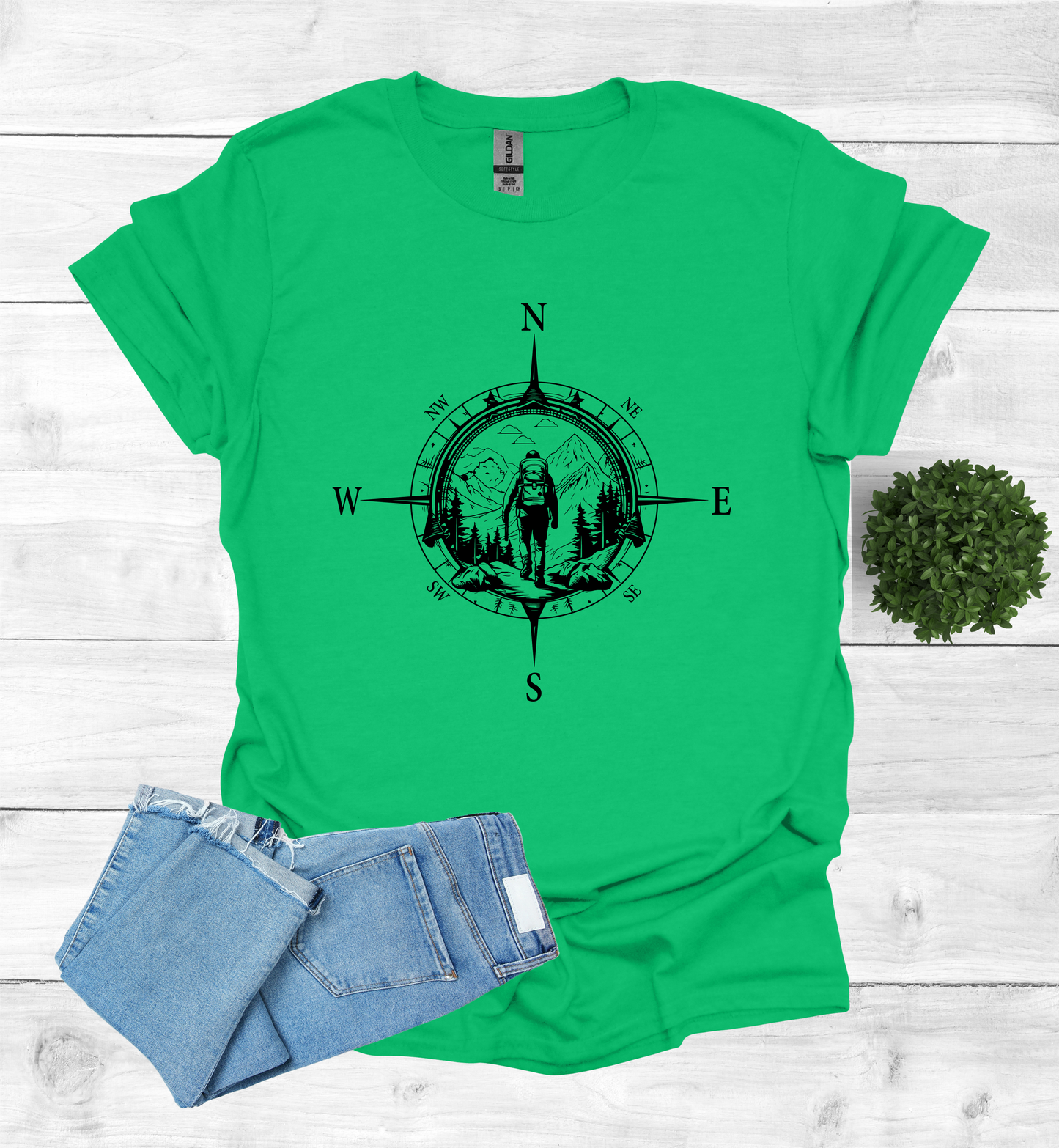 Hiker walking in wilderness compass scene
