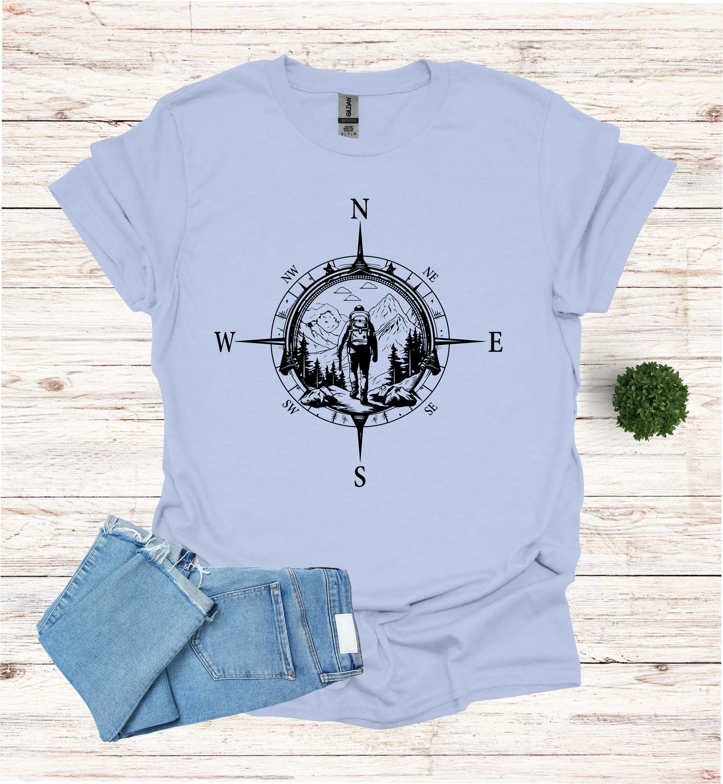 Hiker walking in wilderness compass scene