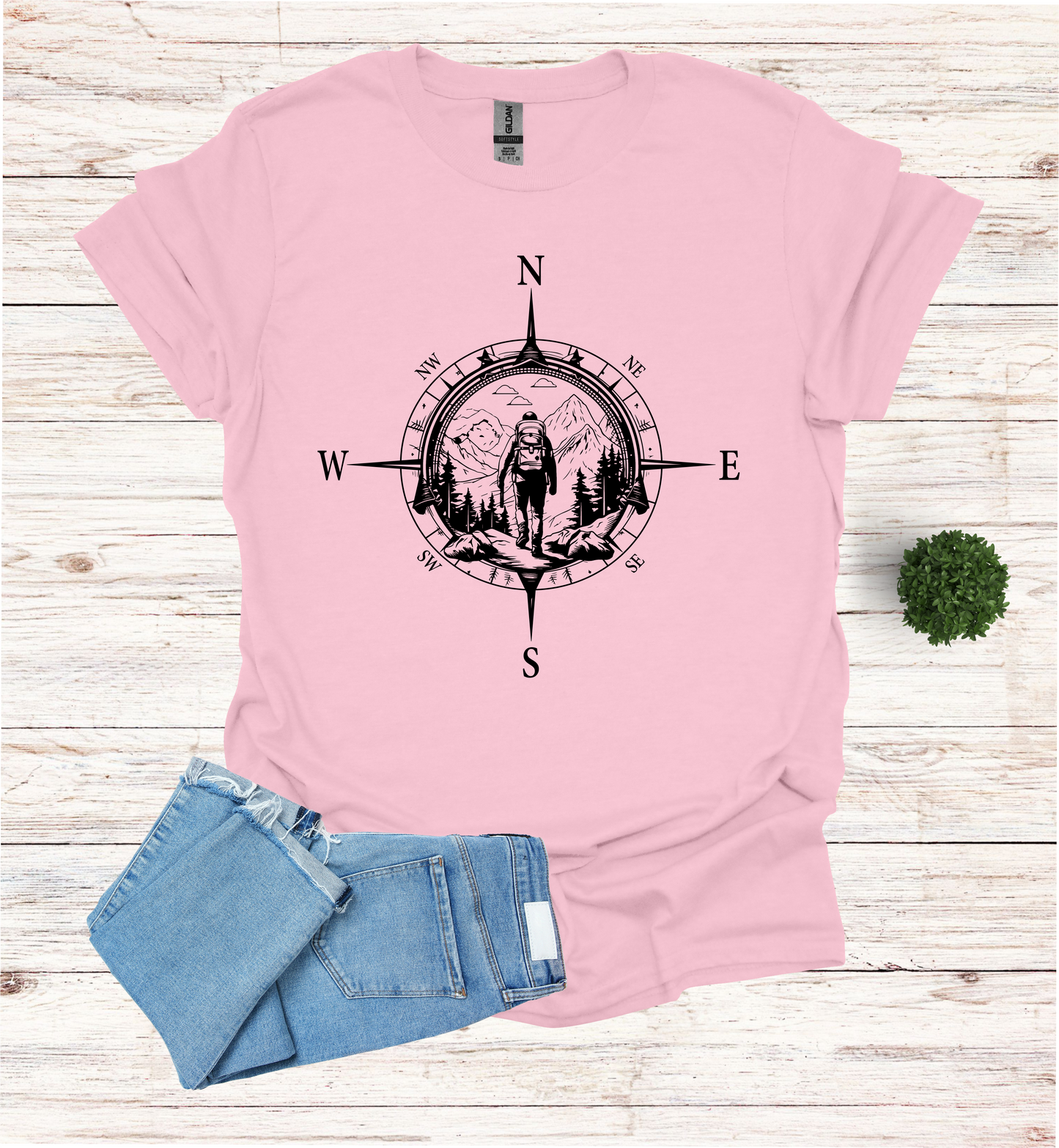 Hiker walking in wilderness compass scene