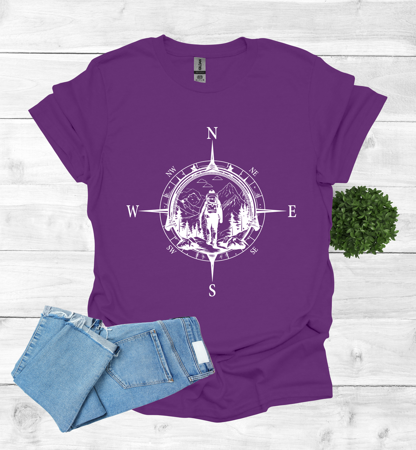 Hiker walking in wilderness compass scene