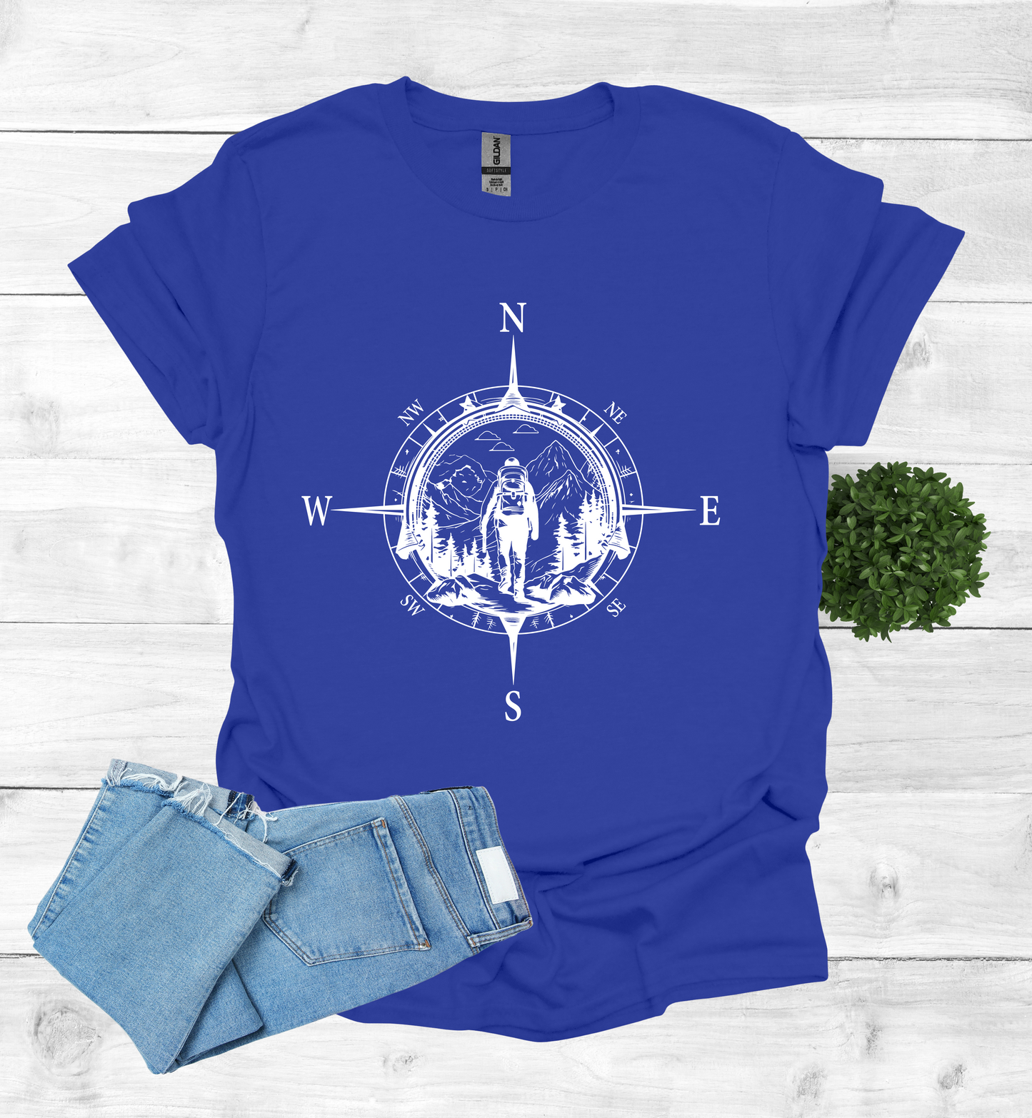 Hiker walking in wilderness compass scene