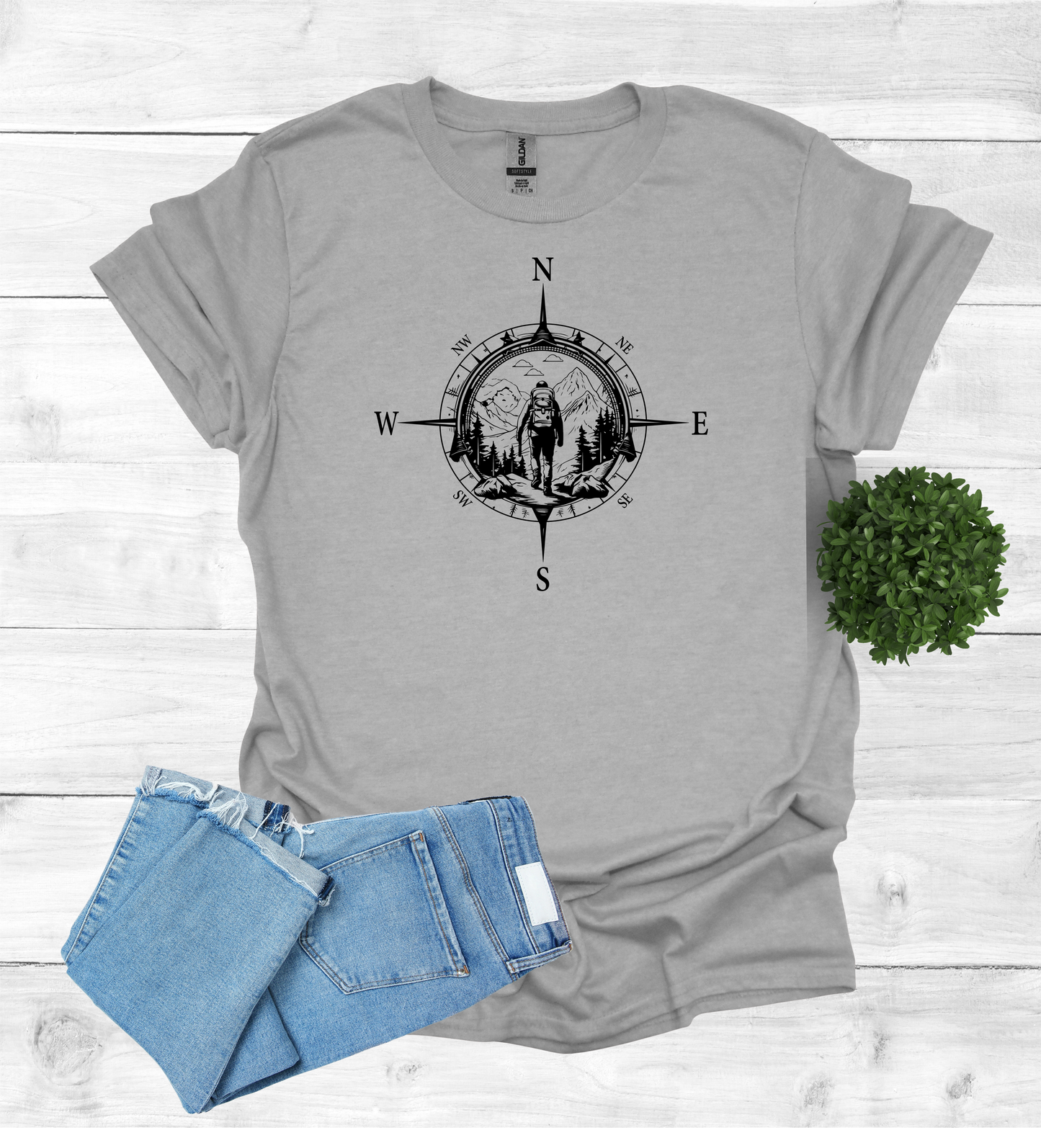 Hiker walking in wilderness with a compass scene